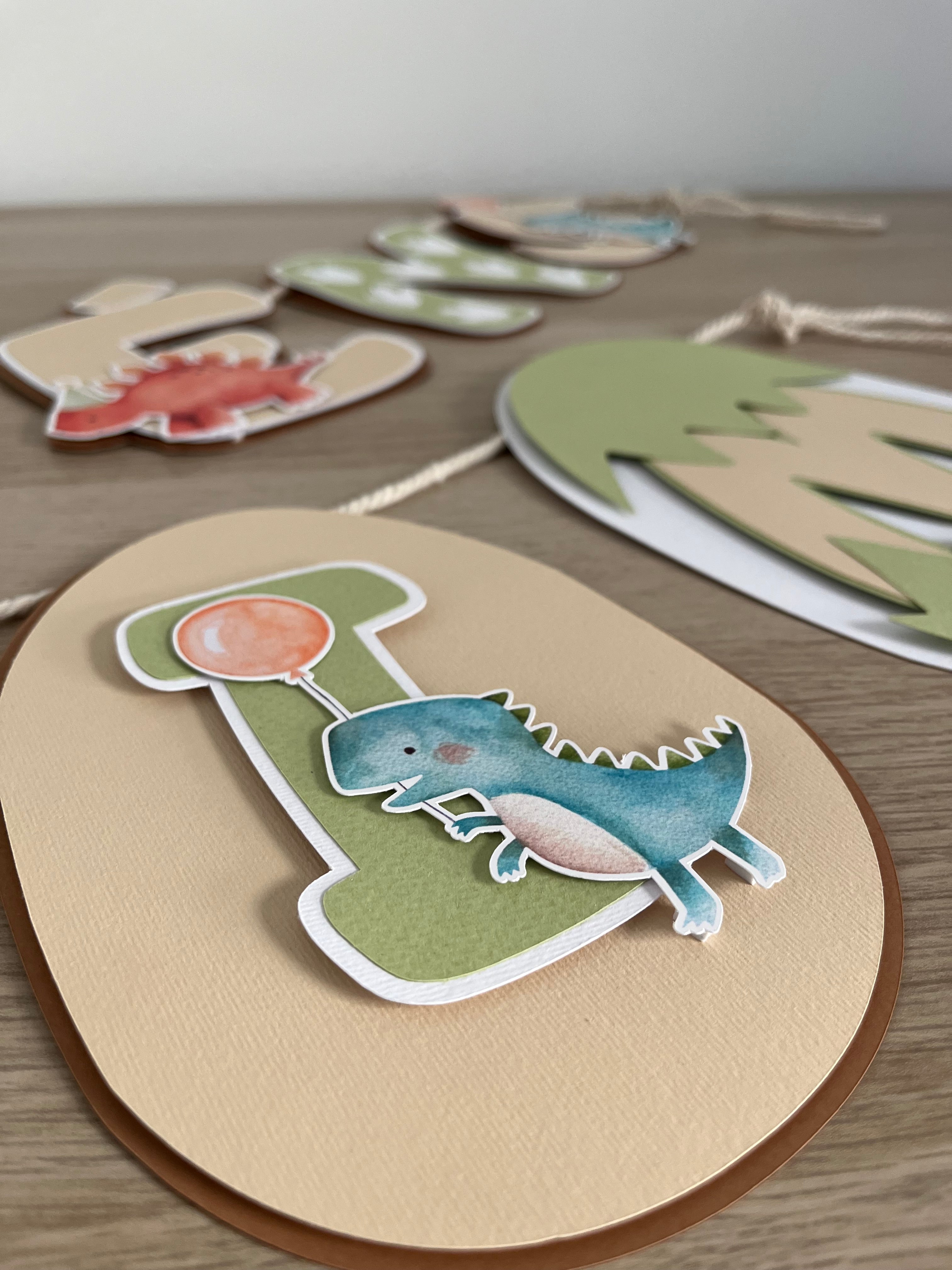 Dinossauros em festa | Bandeirola nome