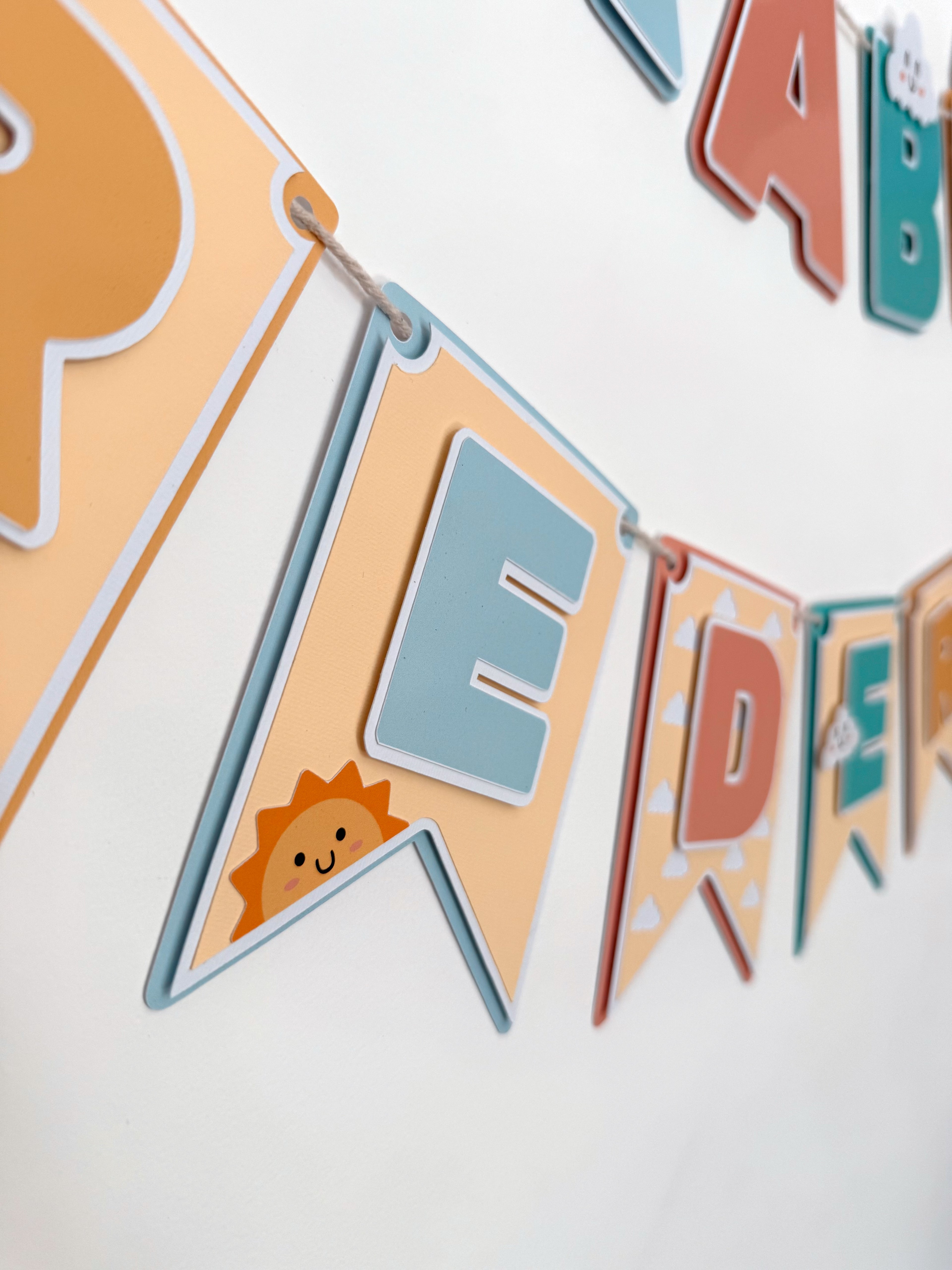 Sol e nuvens fofinhos | Bandeirola nome