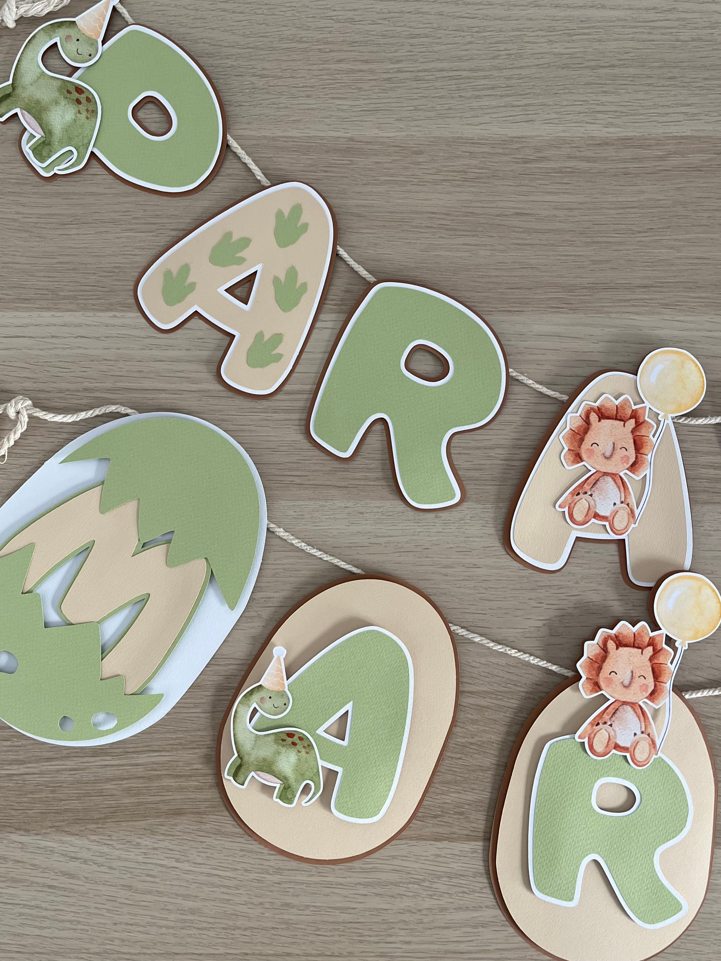 Dinossauros em festa | Bandeirola nome